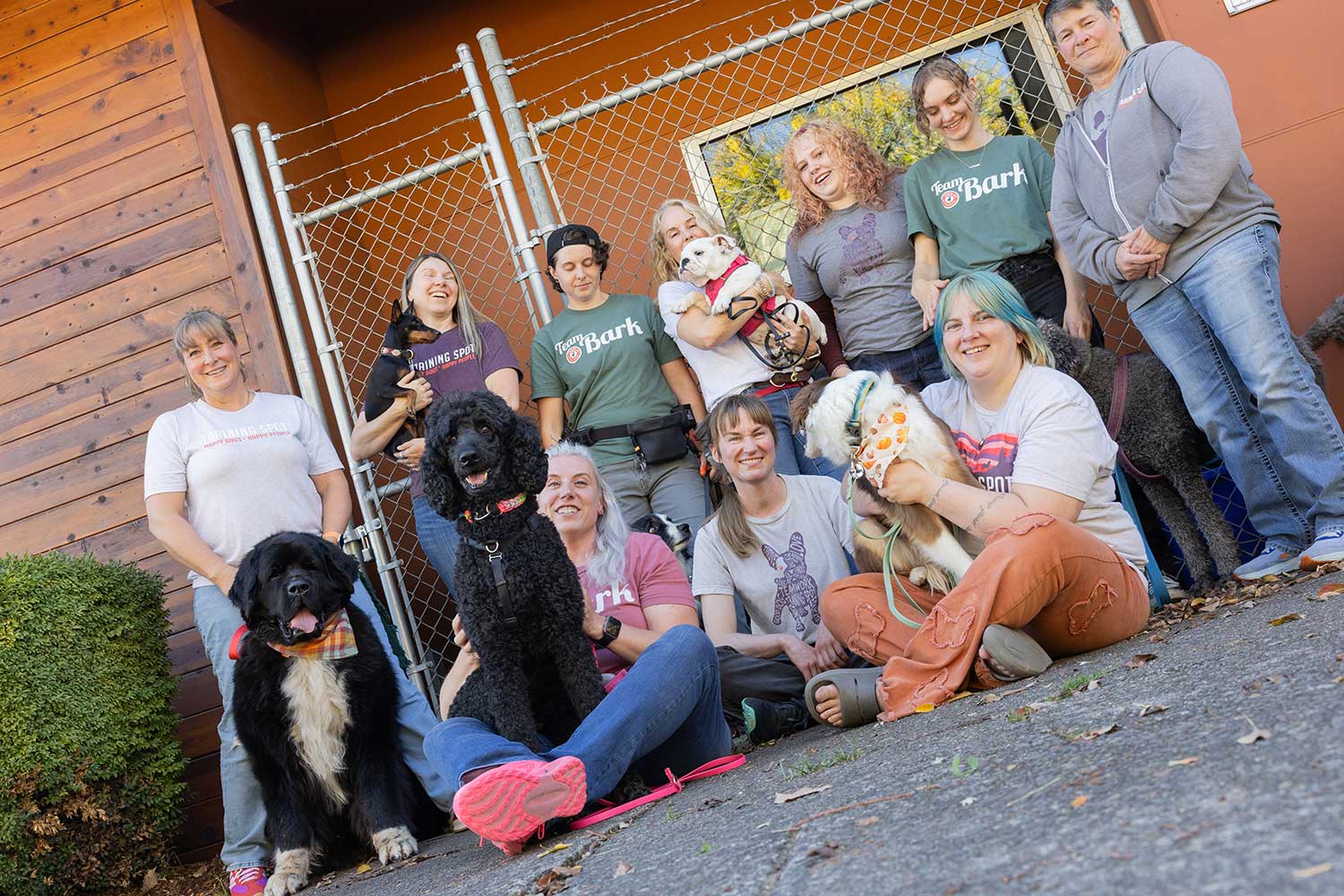 Training Spot team members gathered outside with their dogs