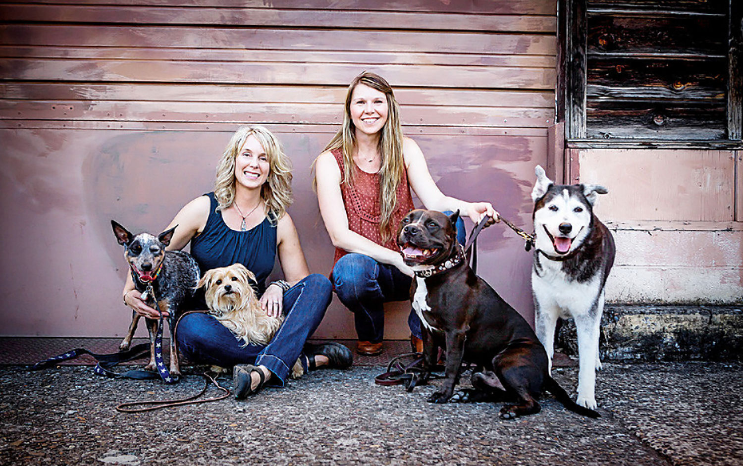 Jen Biglan and Tera Dschaak-James together with their dogs